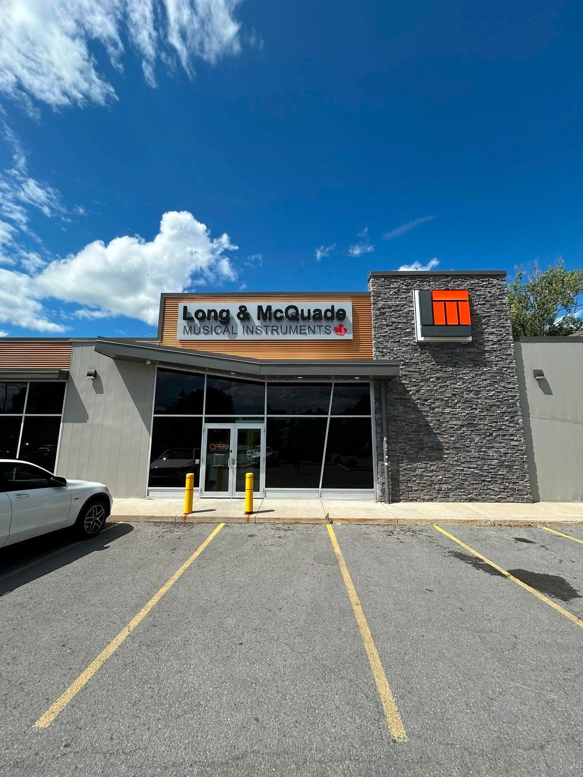 Long & McQuade Musical Instruments storefront, a completed commercial job